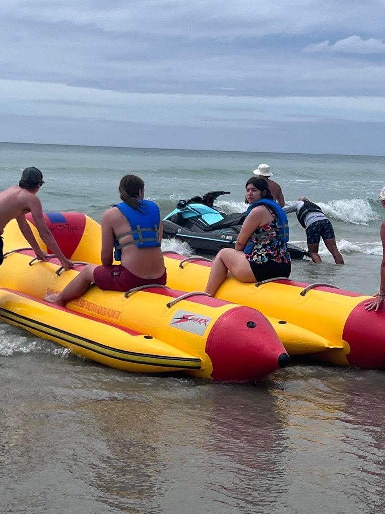The banana boat with Jessi and her brother waiting to go into the ocean