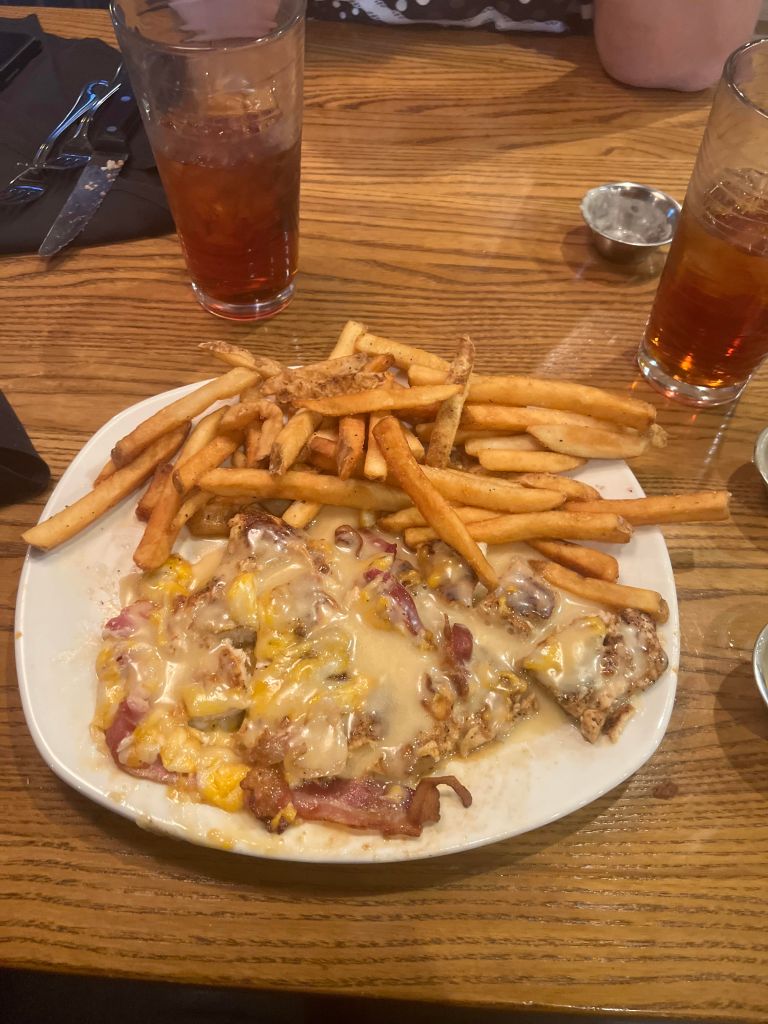 the alice spring's chicken at Outback Steakhouse with extra honey mustard and a side of fries. 