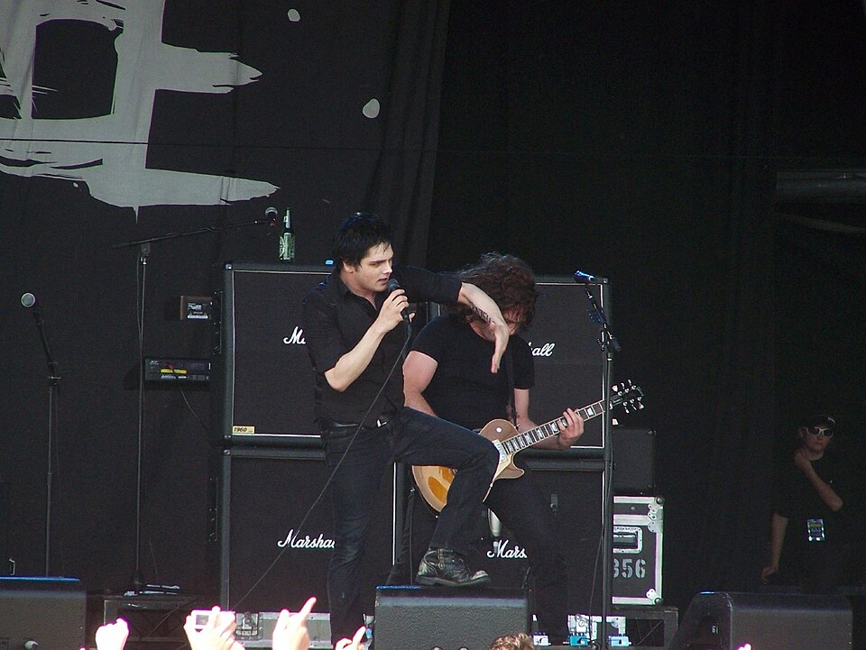 Gerard Way of My Chemical Romance singing on Stage